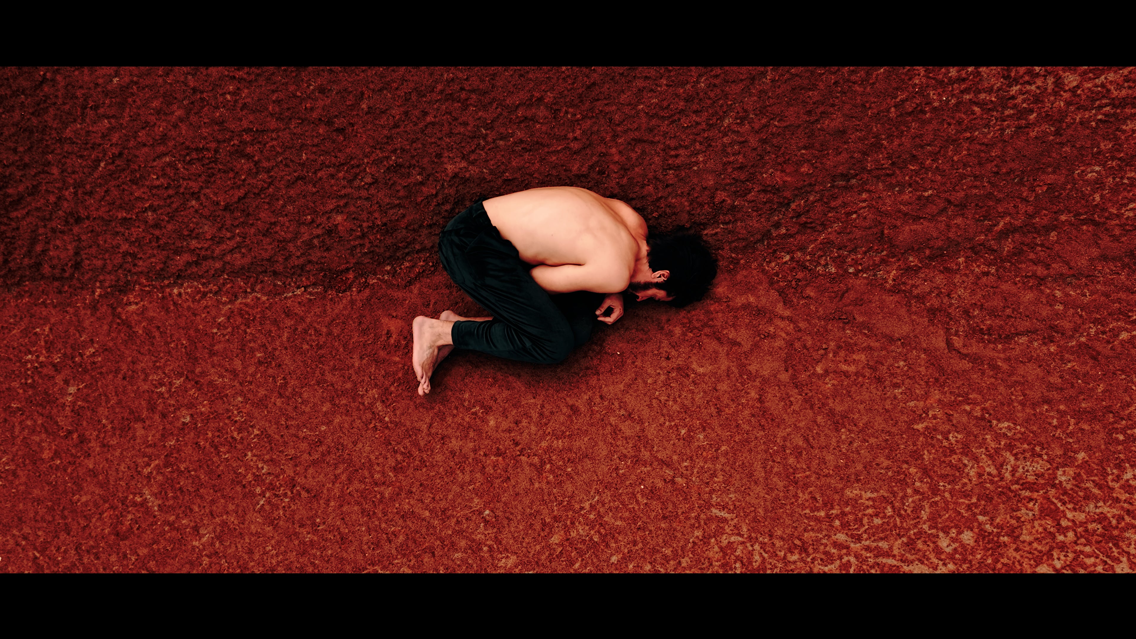 DANTE film still — the awakening on red earth